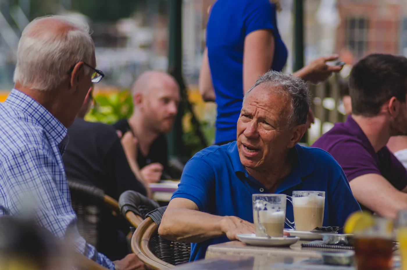 Two dudes enjoying a Coffee on the streets of Amsterdam., by Shane Rounce (Ace Media)